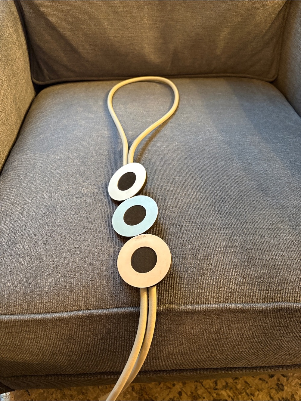 Modern Circular Pendant Rubber Necklace in Beige, Blue, and Black